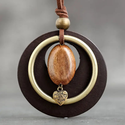 Collier pendentif bois bijou femme fève style bohème rustique moderne élégant vintage cadeau anniversaire mariage écologique durable - lebois-eco.com