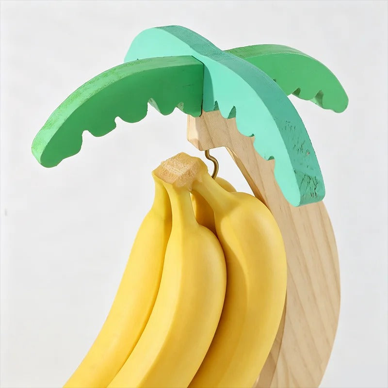 Détail du crochet et des feuilles du support à bananes palmier